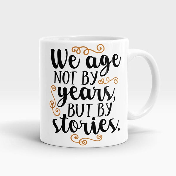 We Age By Stories Mug